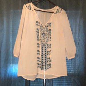 Quarter length white blouse